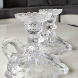 Pair of hand candlesticks/glassware from Portieux/Vallerysthal. In molded glass. Zoomorphic form of turtle carrying a griffin on its back.