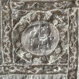 Embroidered lace cover