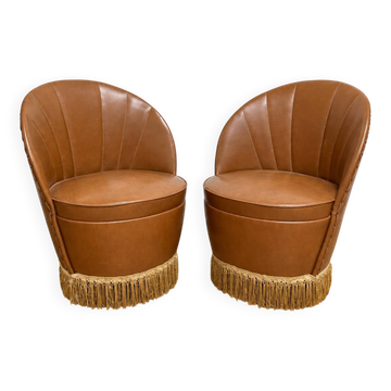 Pair of vintage cognac fringed tub chairs