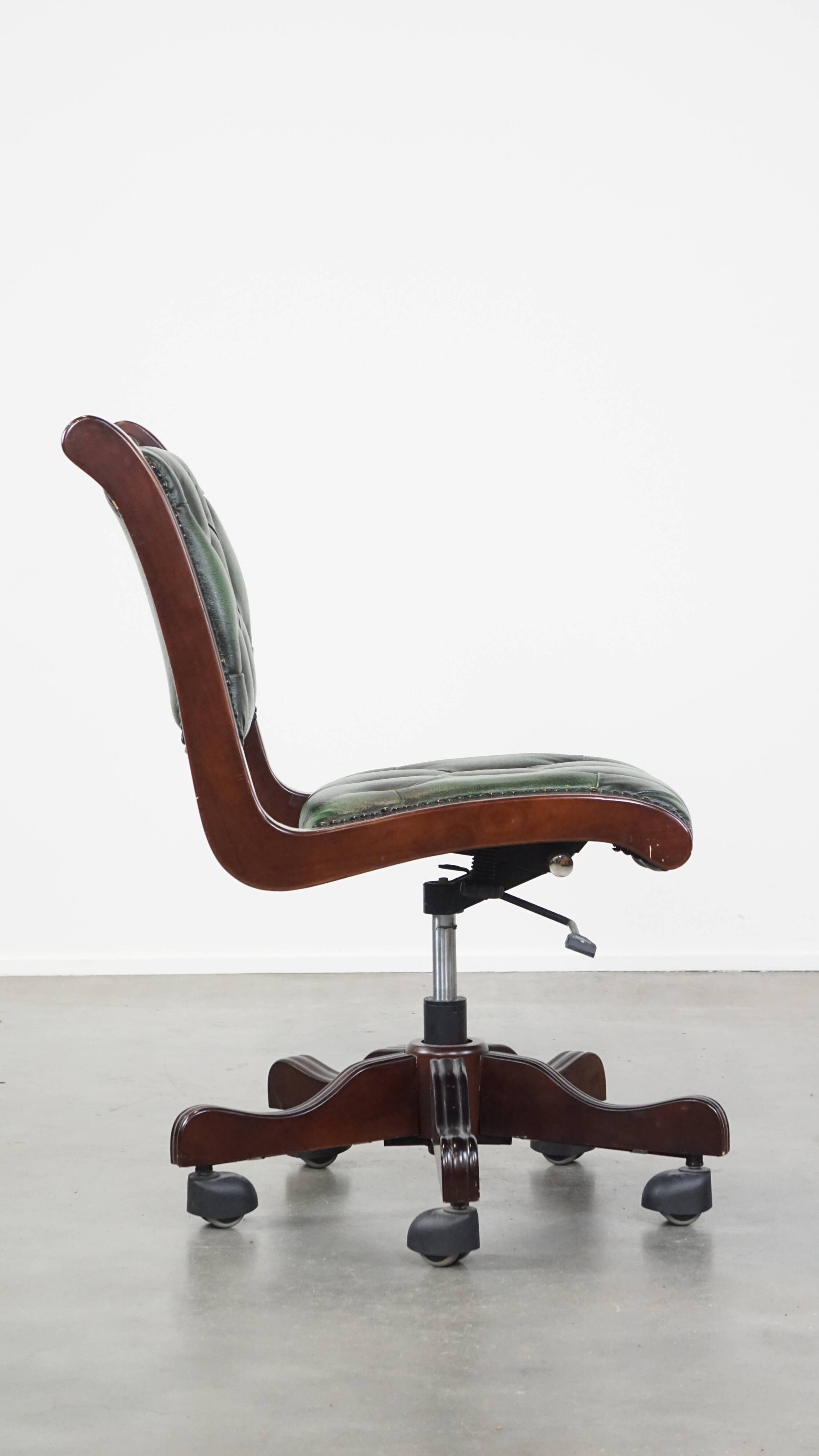 English Chesterfield office chair in green leather, height adjustable on casters