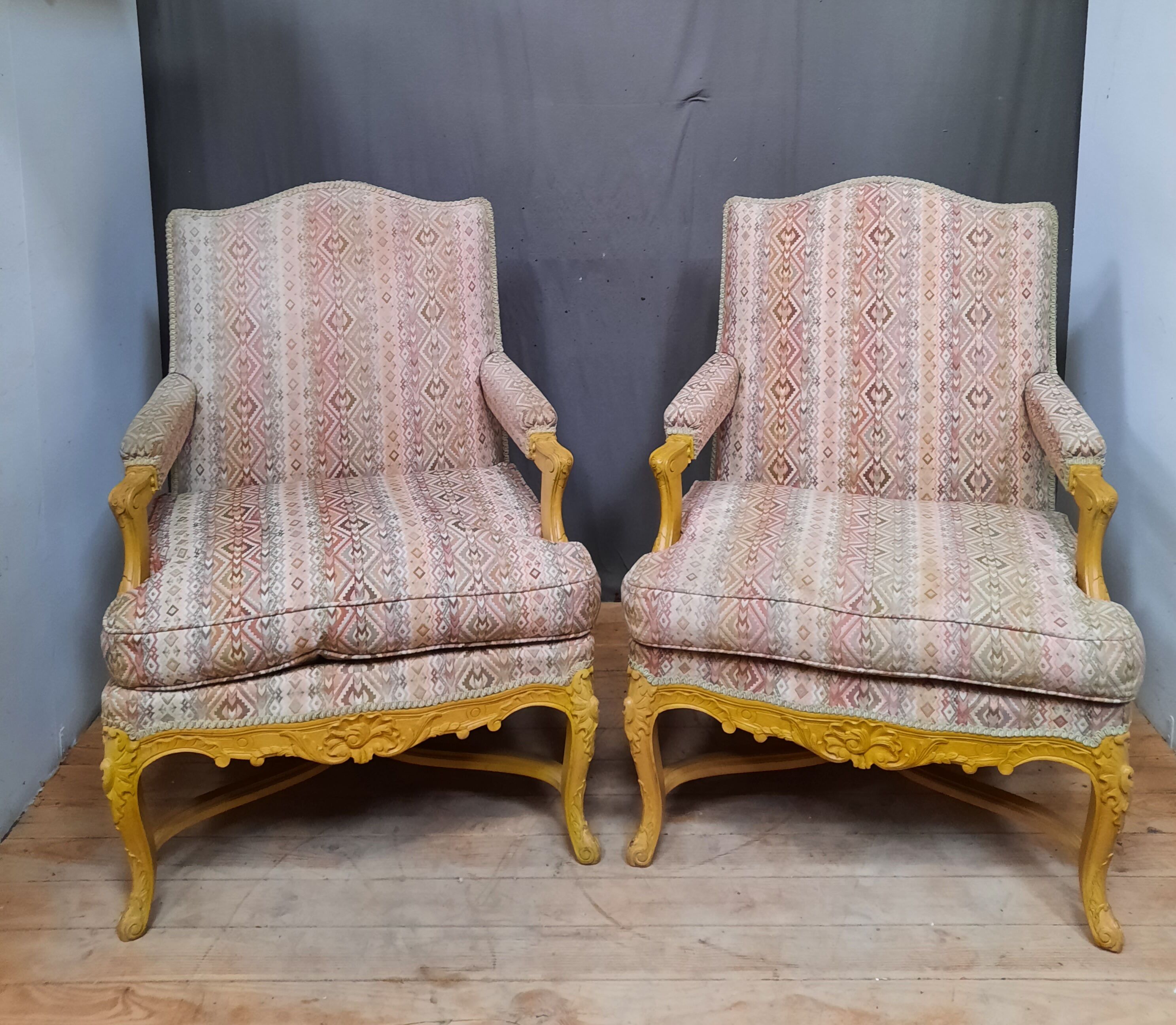 Pair of louis xv style upholstered armchairs