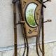Bamboo coat rack from the 19th century, mirror in the shape of a crescent moon.