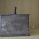 Cashier, patinated safe with its key