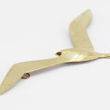 Ancien oiseau en laiton