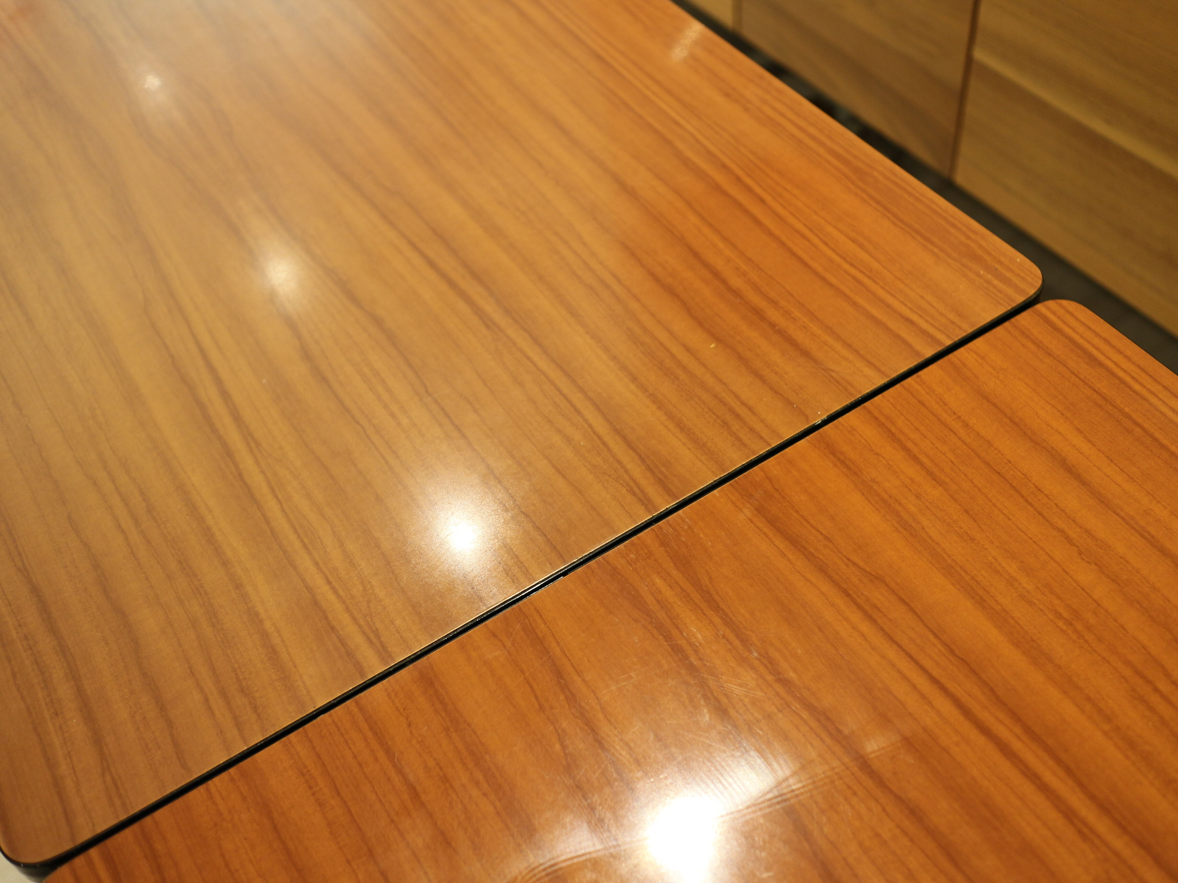 Briwn Formica table with extension cords and drawer