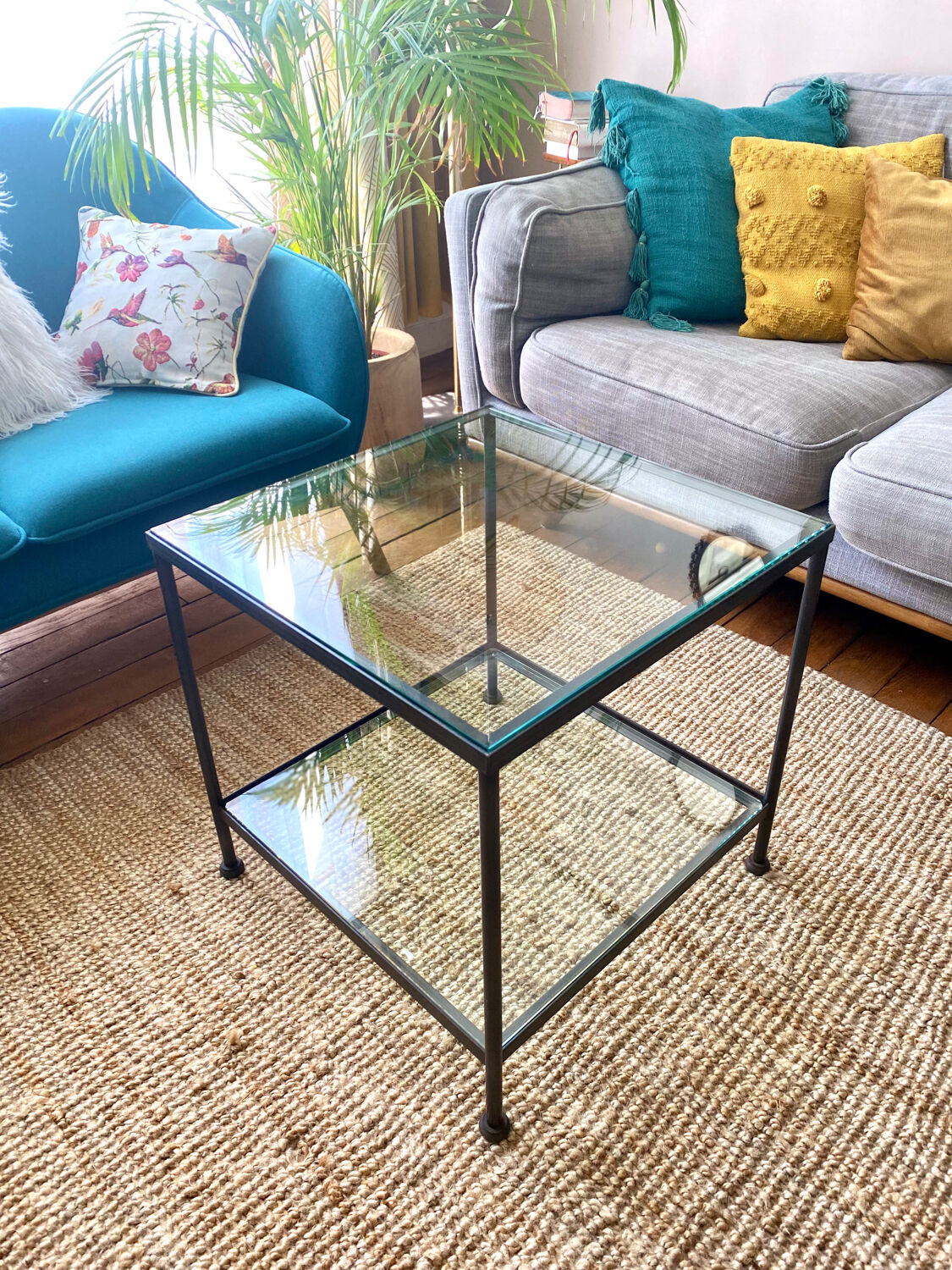 Glass and wrought iron coffee table design