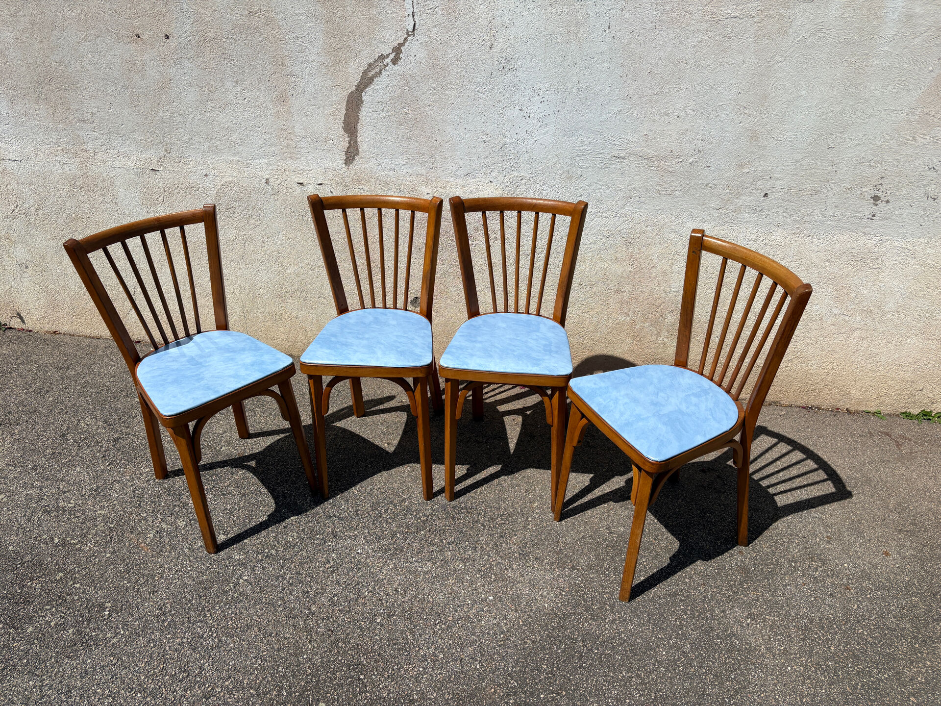 4 blue Baumann bistro chairs