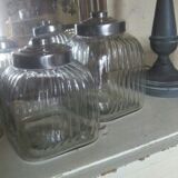 three large glass jars