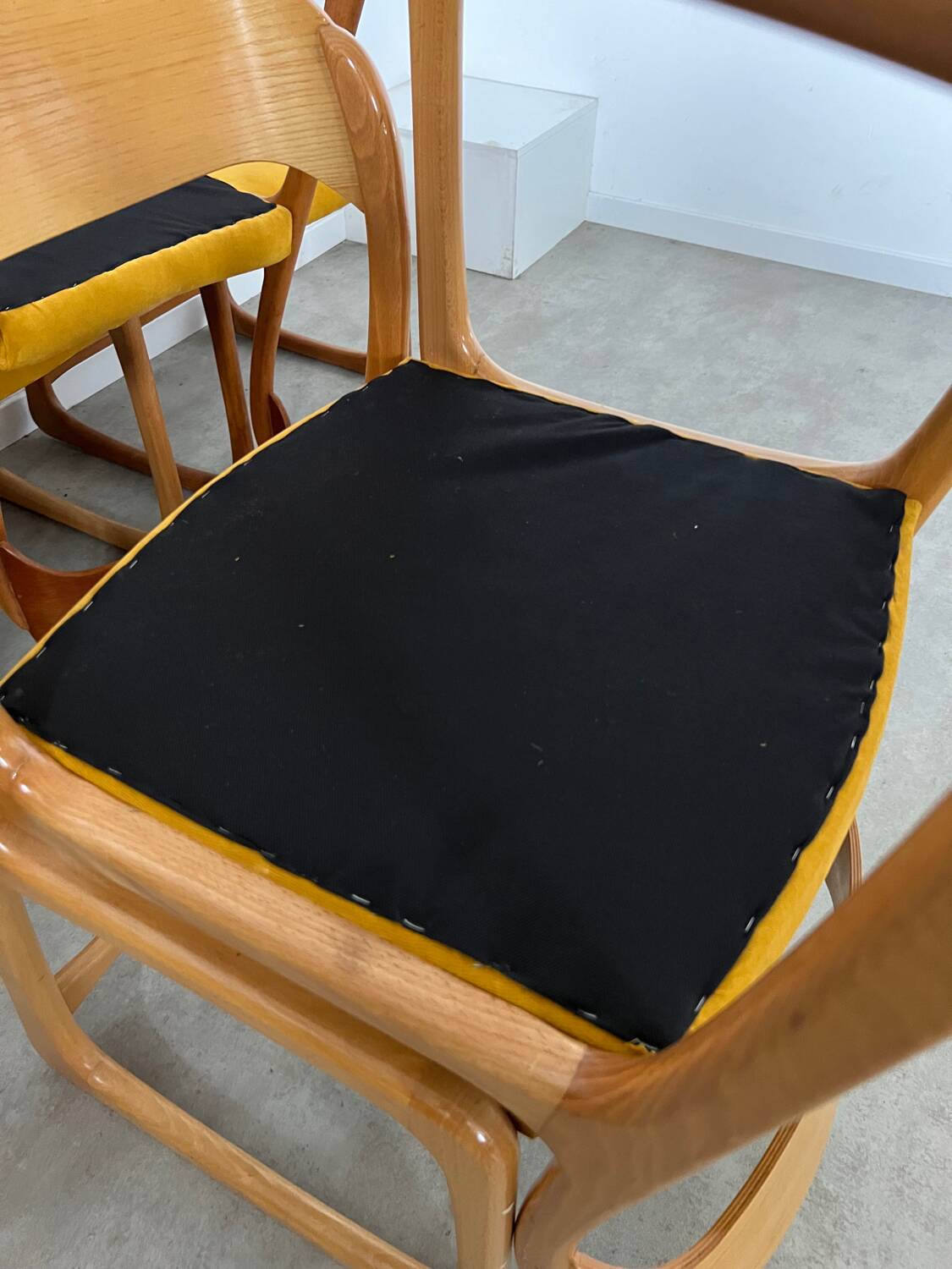 Set of 7 Baumann sled chairs in wood and mustard yellow fabric, 1960s