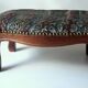 Small foot stool made of wood with upholstery, vintage from the 70s