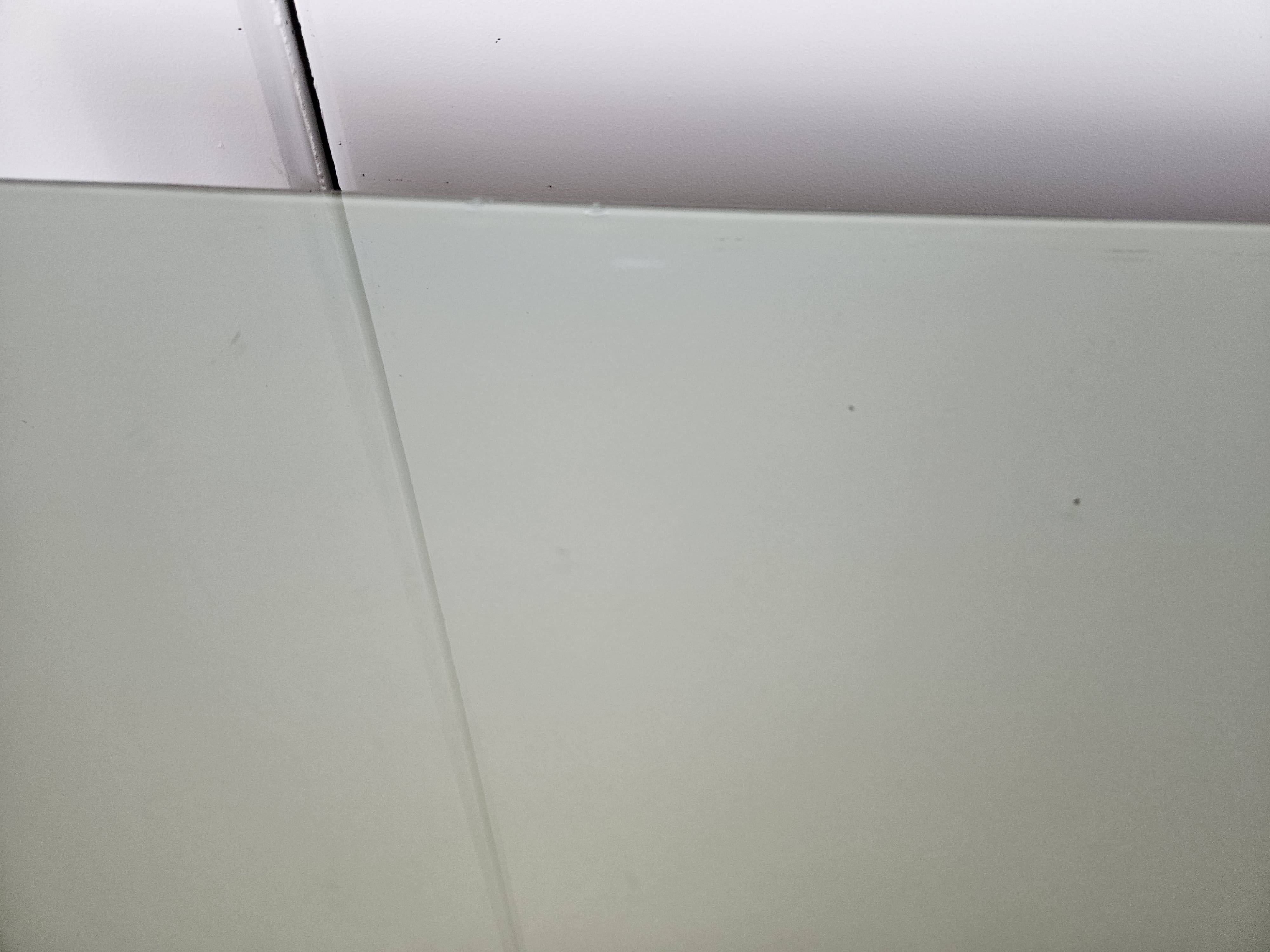 1960s chest of drawers in mahogany and lacquered mahogany with blue glass