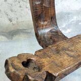 Brutalist tripod low chair