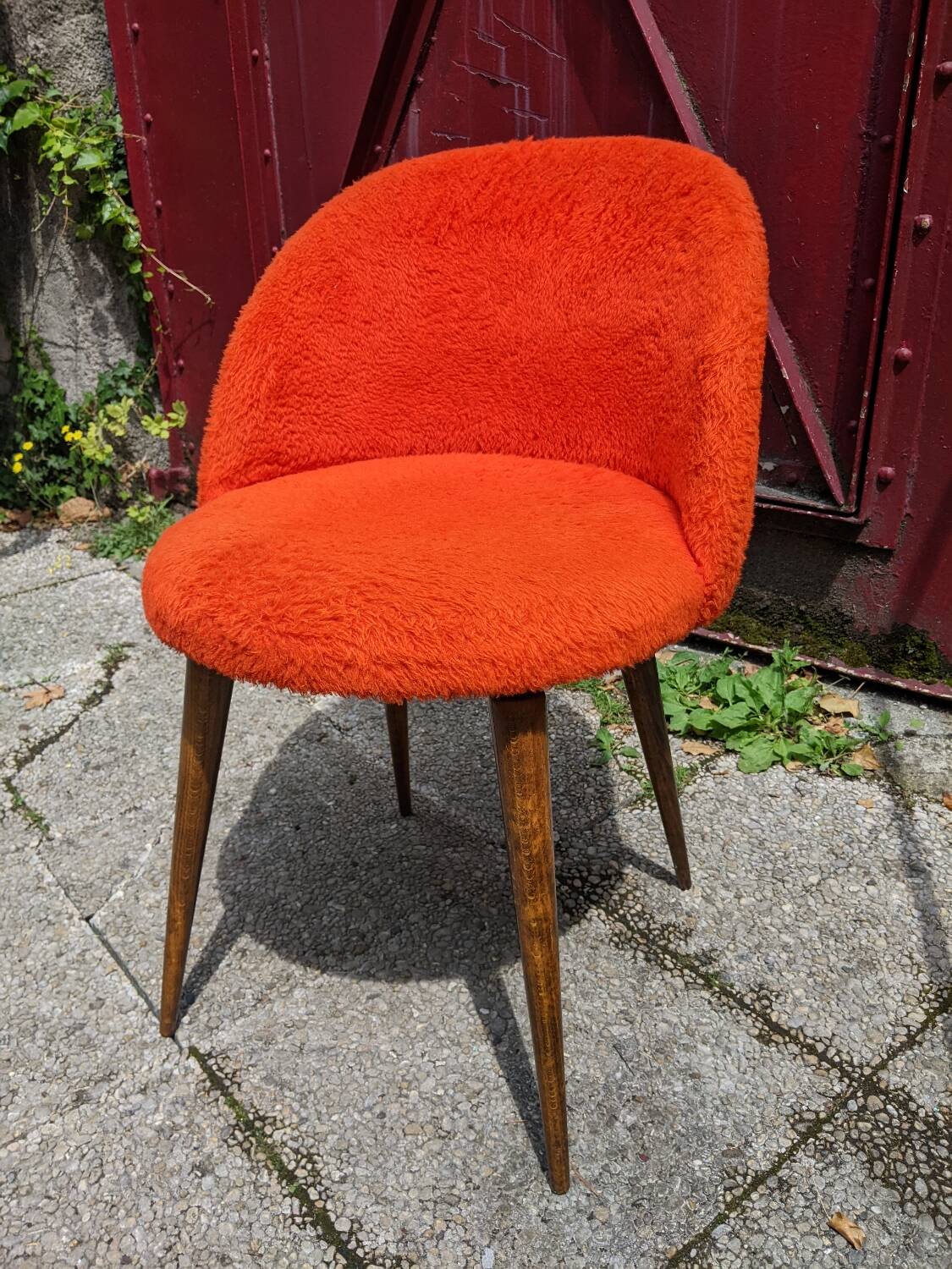 Orange furry barrel chair