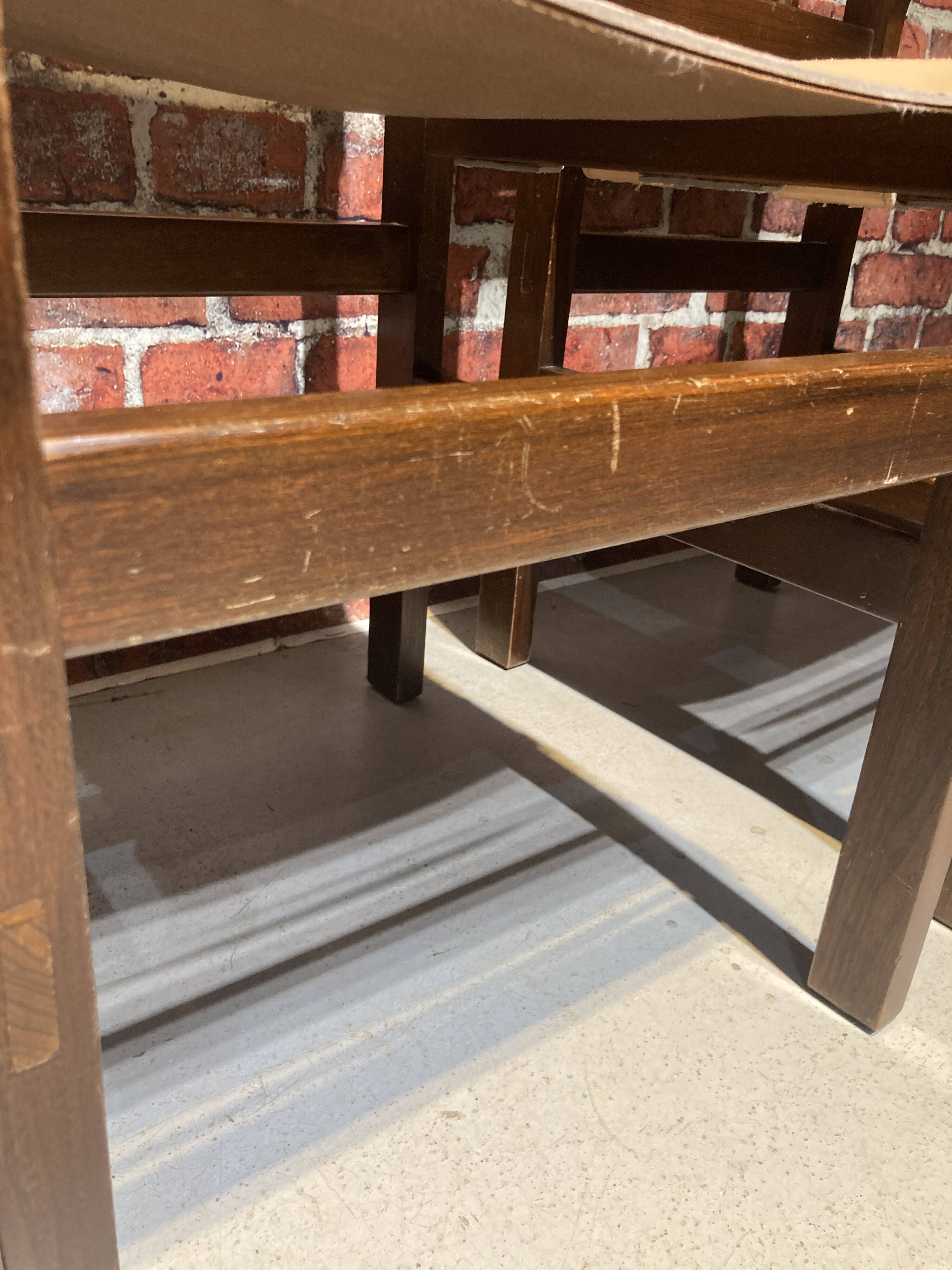 Set of four wooden and leather chairs from Maison Regain