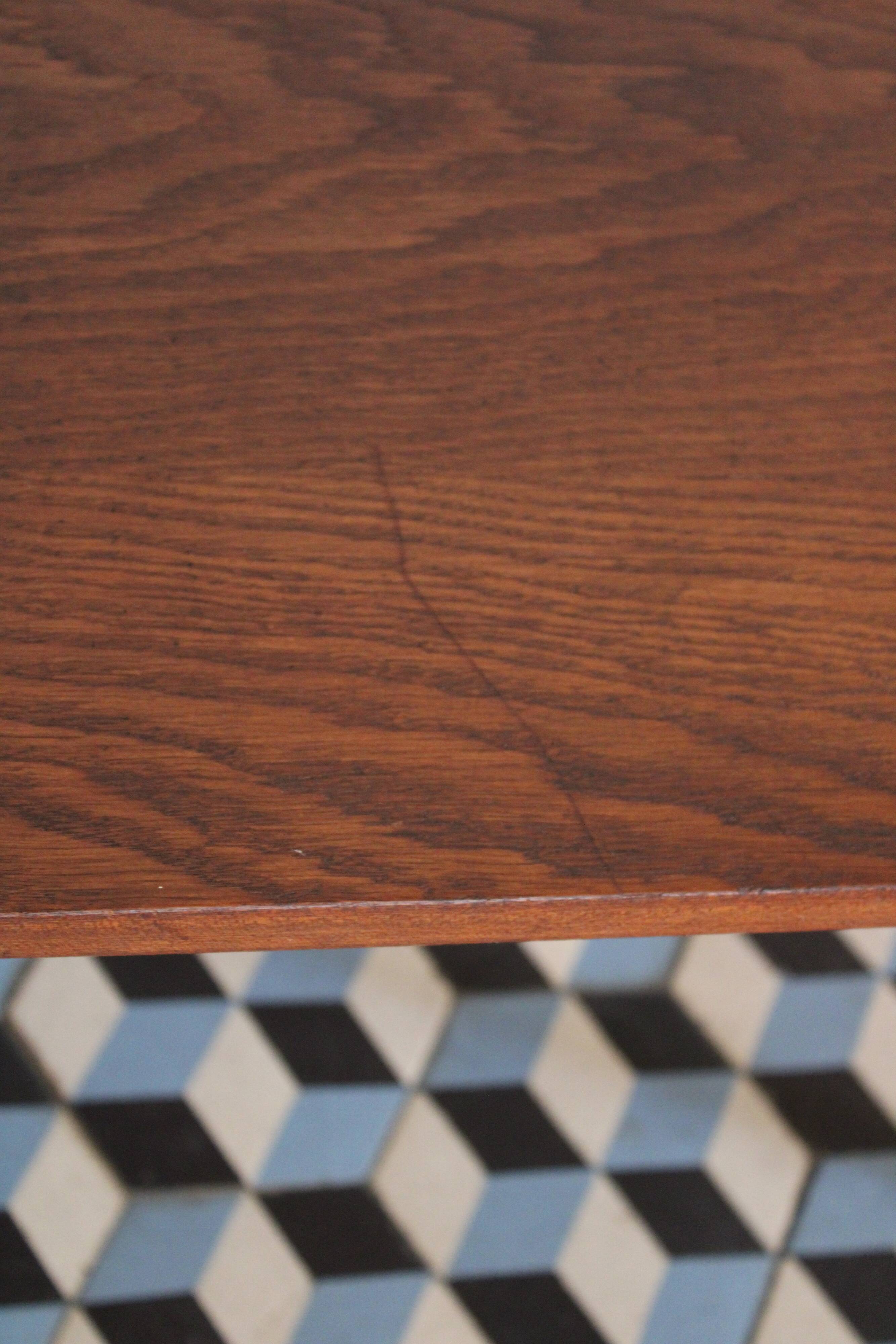 Teak coffee table with compass feet