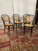 Set of 4 bentwood bistro chairs in black with caning.