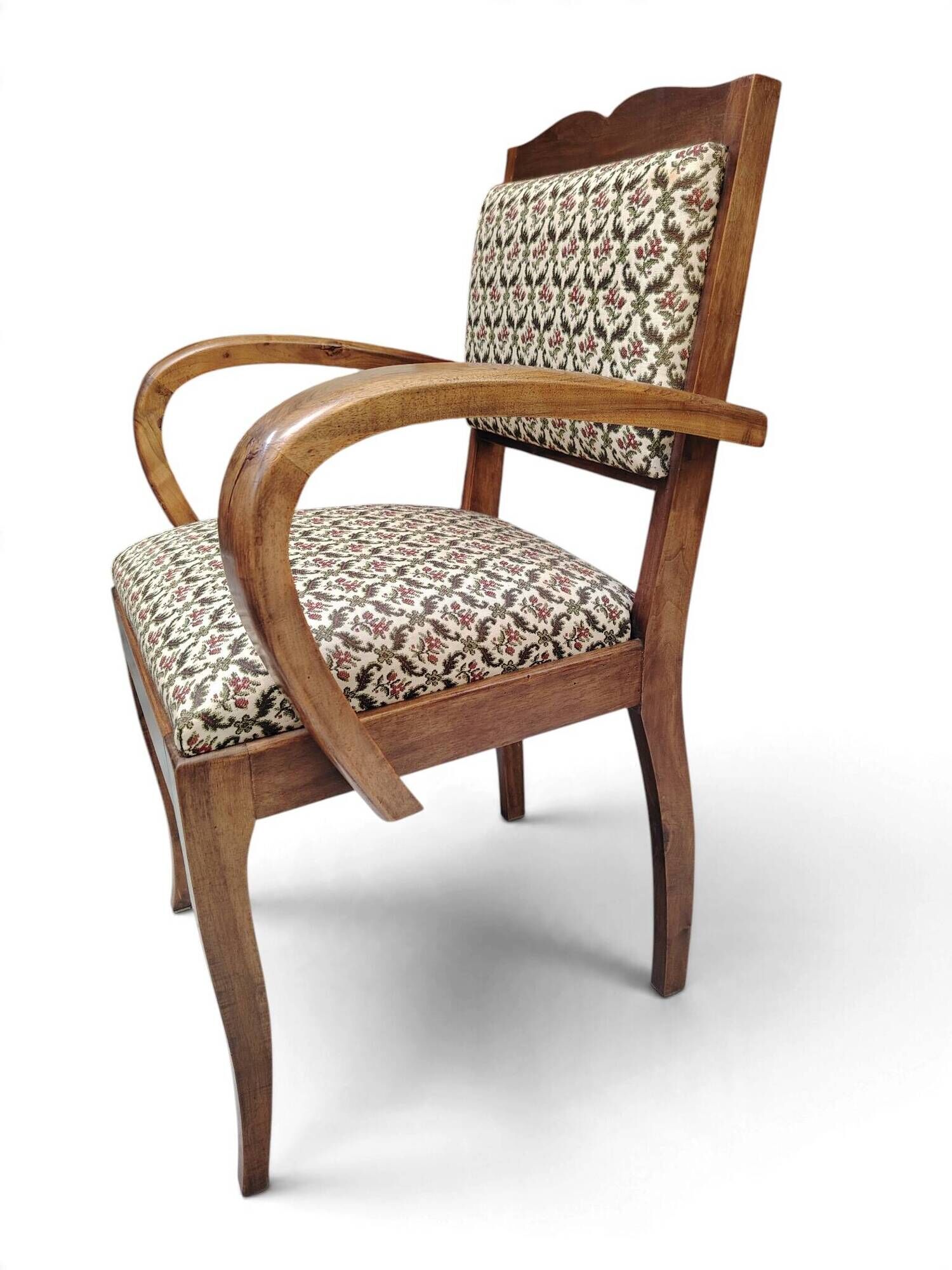 Art Deco armchair with a moustache backrest and curved armrests from the 1930s.