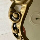 Large golden baroque style mirror