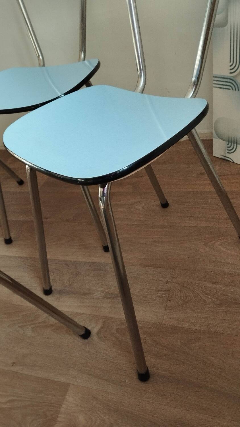 4 blue Formica chairs