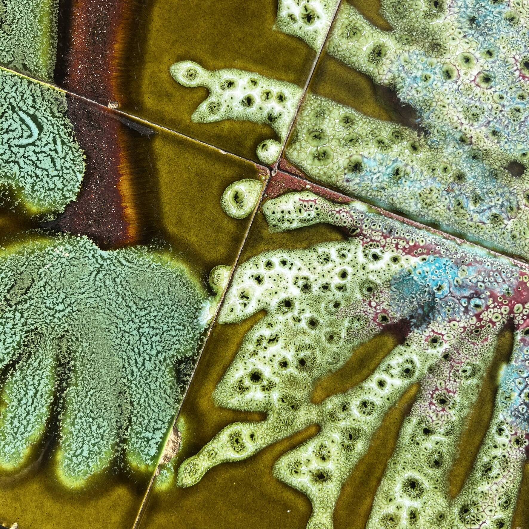 Vintage ceramic coffee table, floral patterns and chrome base.