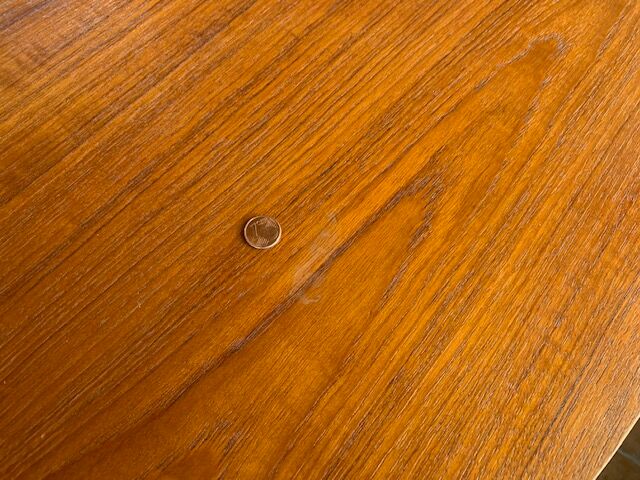 Expandable teak dining table, butterfly extension, circa 60s