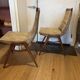 (Lot) 2 teak designer chairs (1950s)