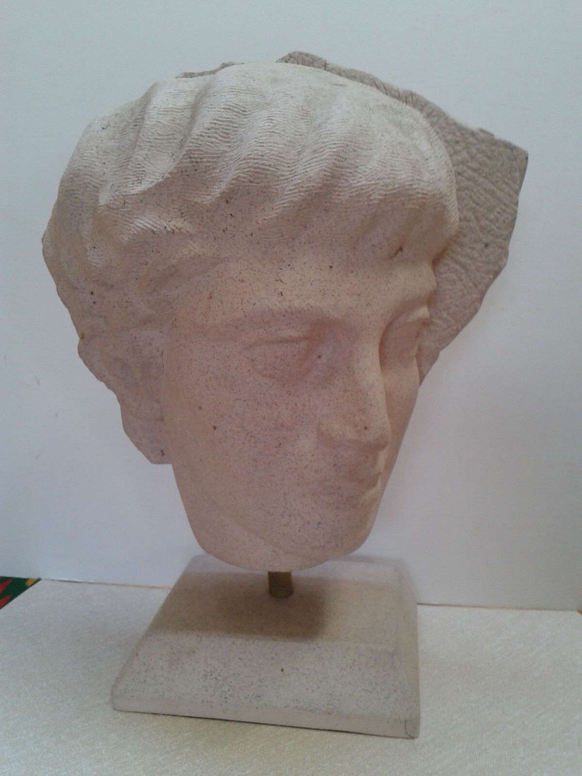 Ephebe head in sandstone