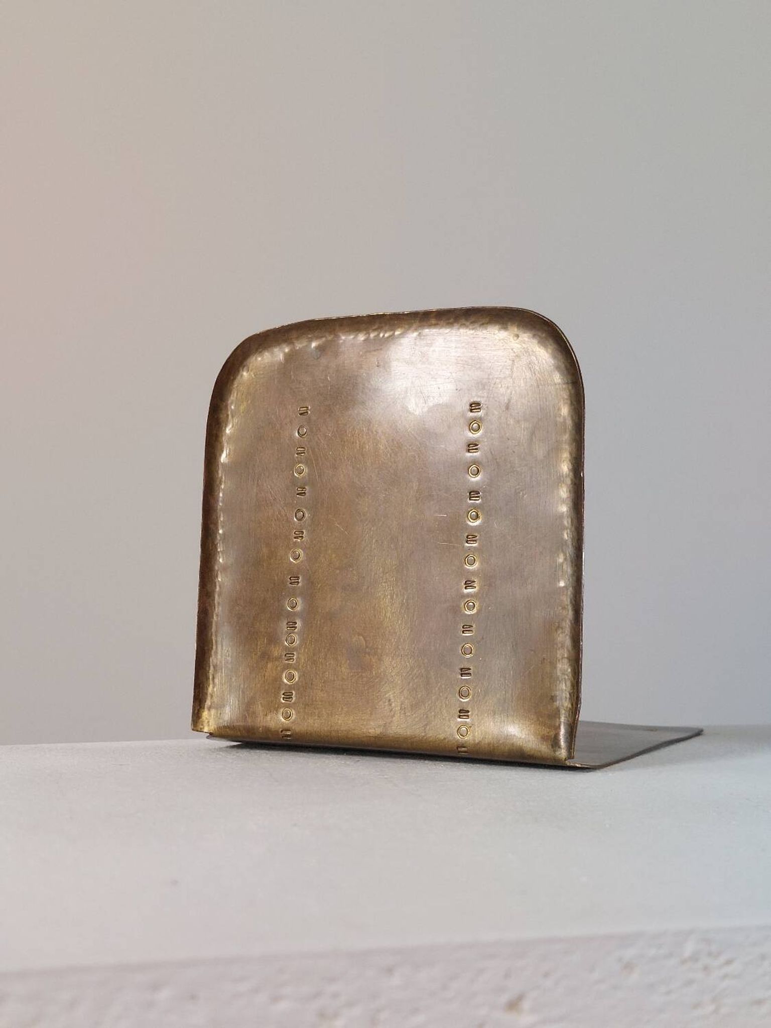 Pair of hand-hammered brass bookends by Hayno Focken
