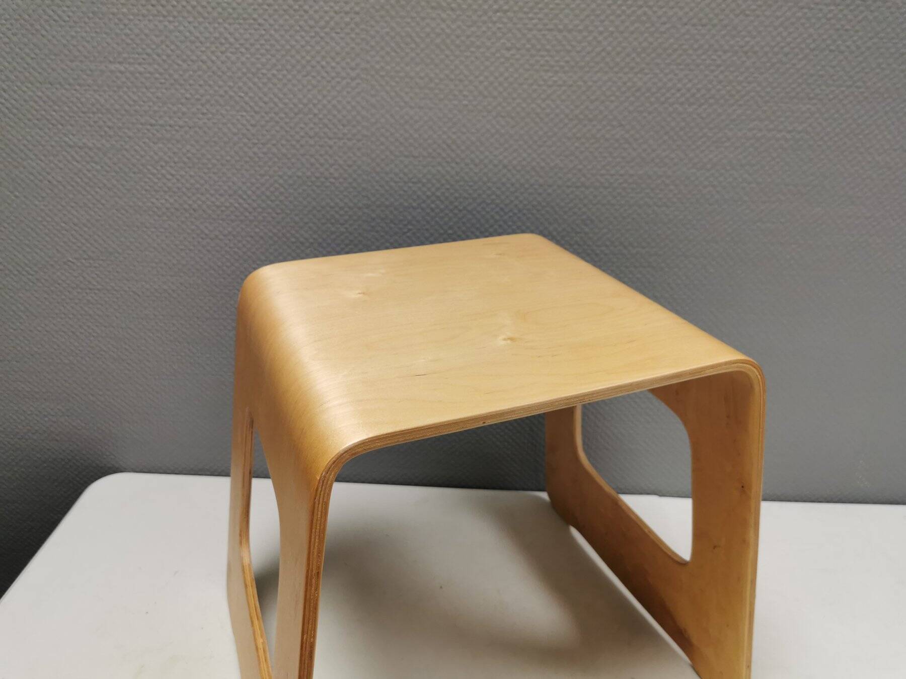 Beautiful design stool/side table made of curved plywood and designed by Lisa Norinder for Ikea.