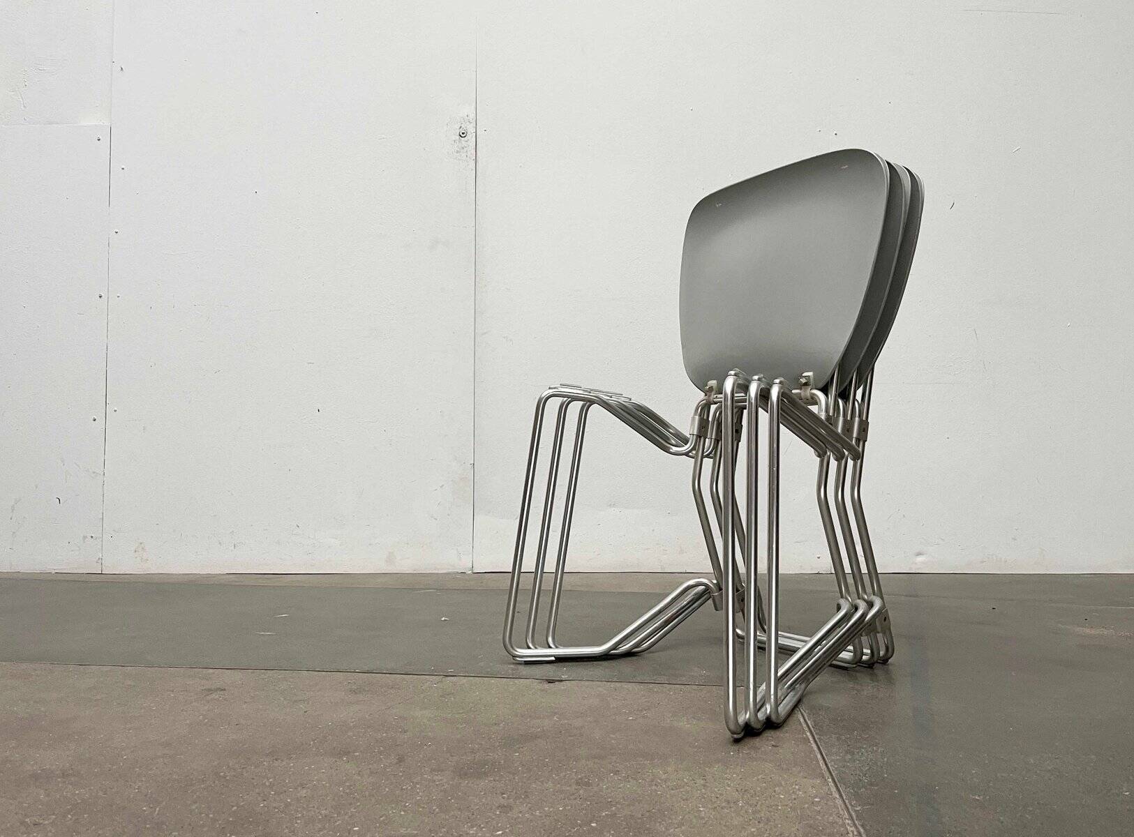Stackable folding chair in space age style from the mid-century by Armin Wirth for Aluflex, 1960s, set of 3.