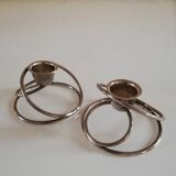 Pair of white metal candle holders