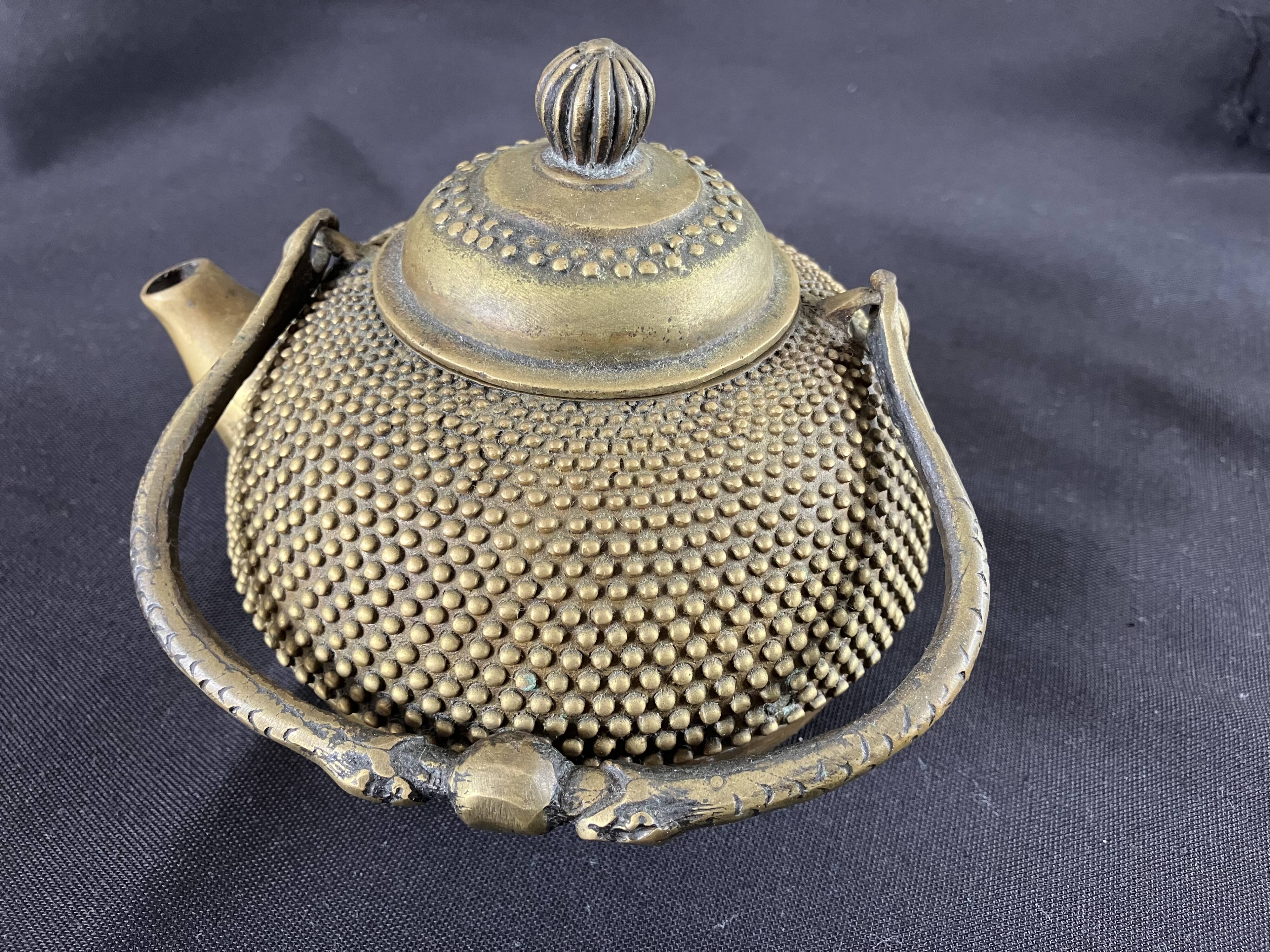 Chinese teapot in brass