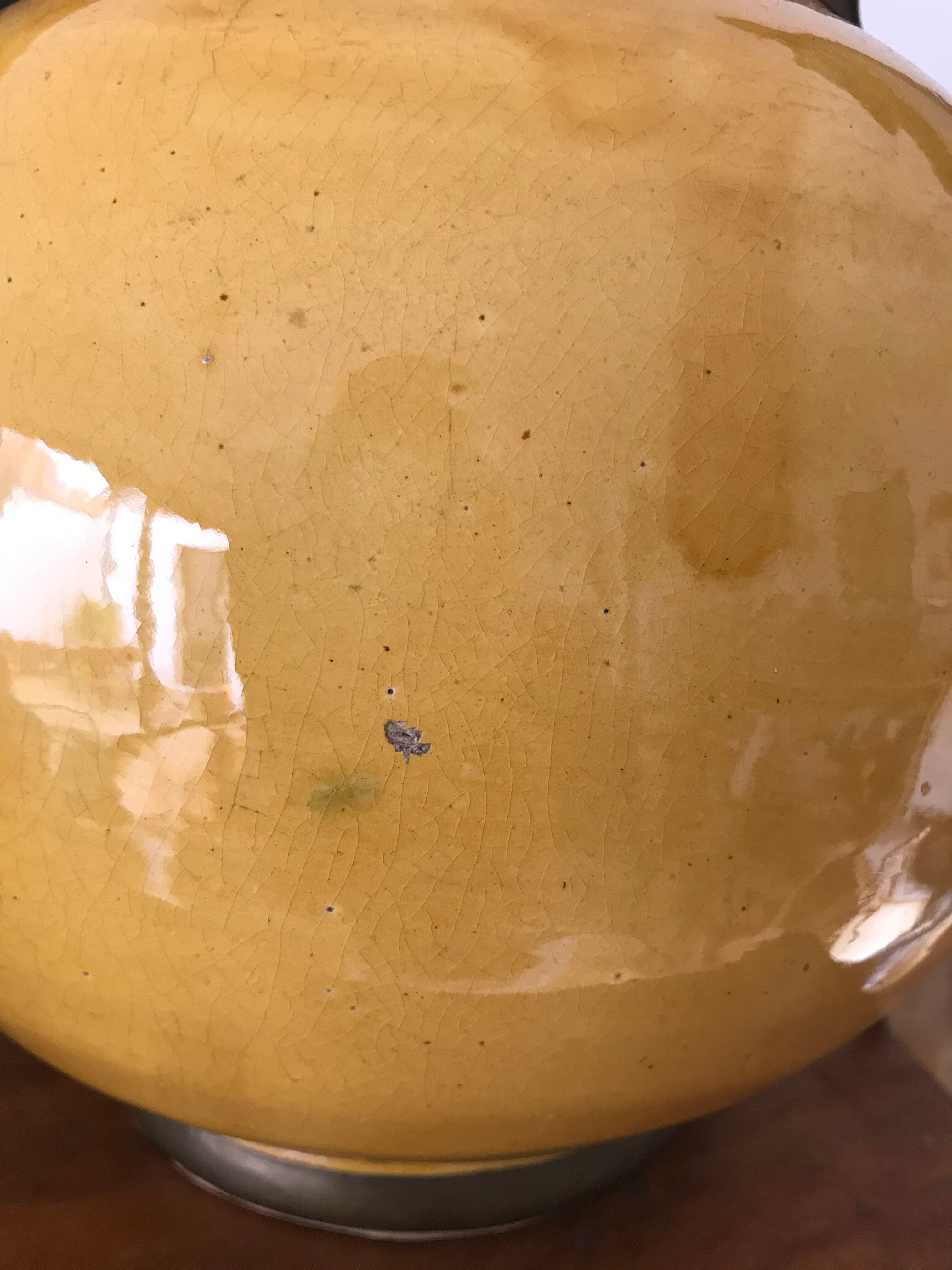 Ancient ceramic and brass lamp foot