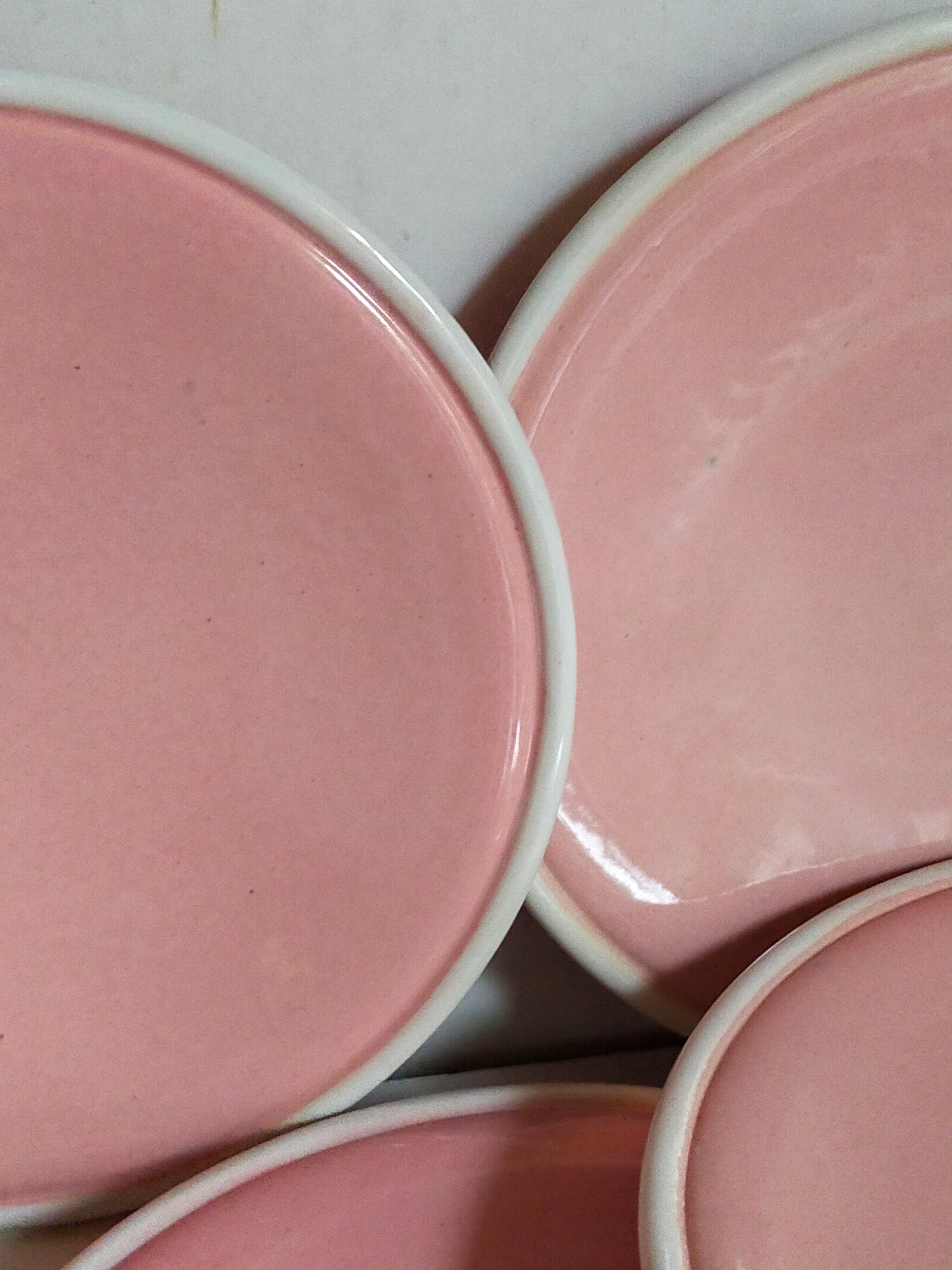 Six old pink earthenware dessert plates