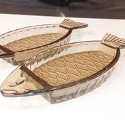 Set of 2 transparent smoked glass bowls in the shape of a fish.
