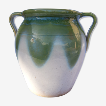 Turquoise green enamelled sandstone pot