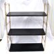 String modular shelf in gilded brass and black lacquered sheet metal Modernist DESIGN 1950-1960