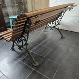 Old cast iron garden bench with oak slats