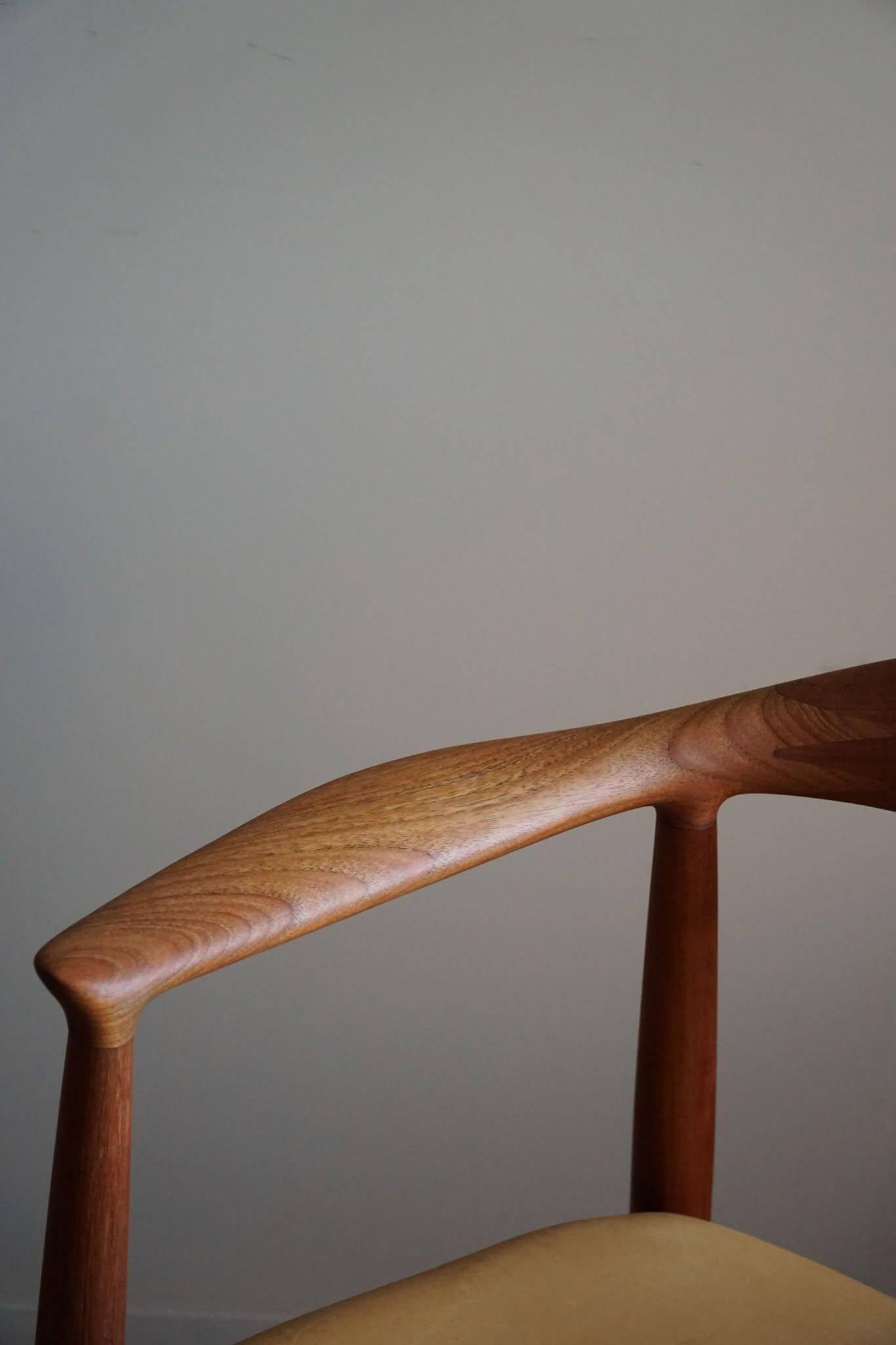 Hans J. Wegner, Teak and leather armchair, model "The Chair" JH501, 1950s