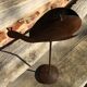 Metal ashtray shaped snail on foot tumble type