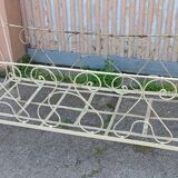 Magnificent bench/antique wrought iron bed.