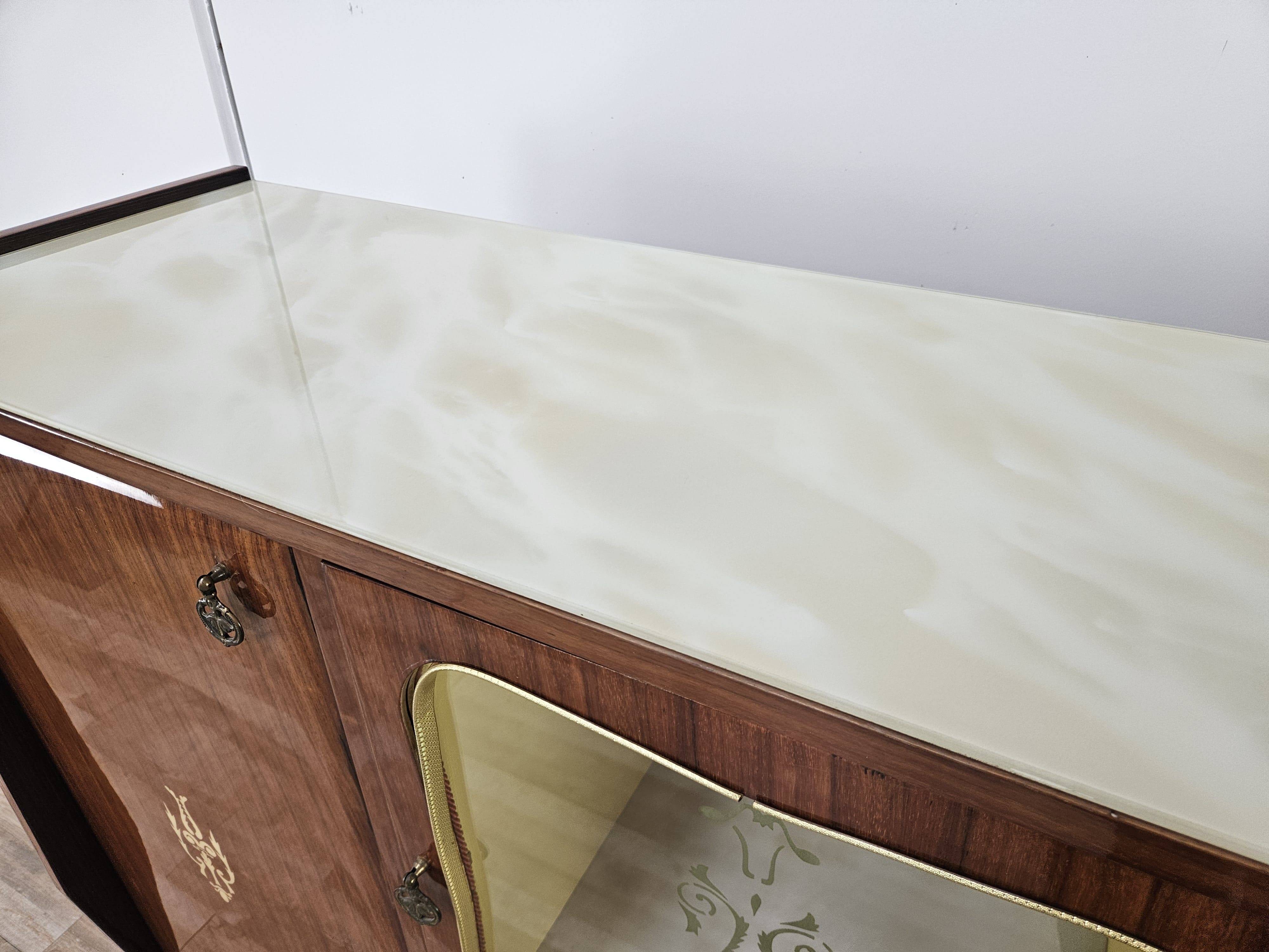 Mid-century 1960s mahogany showcase with glass top