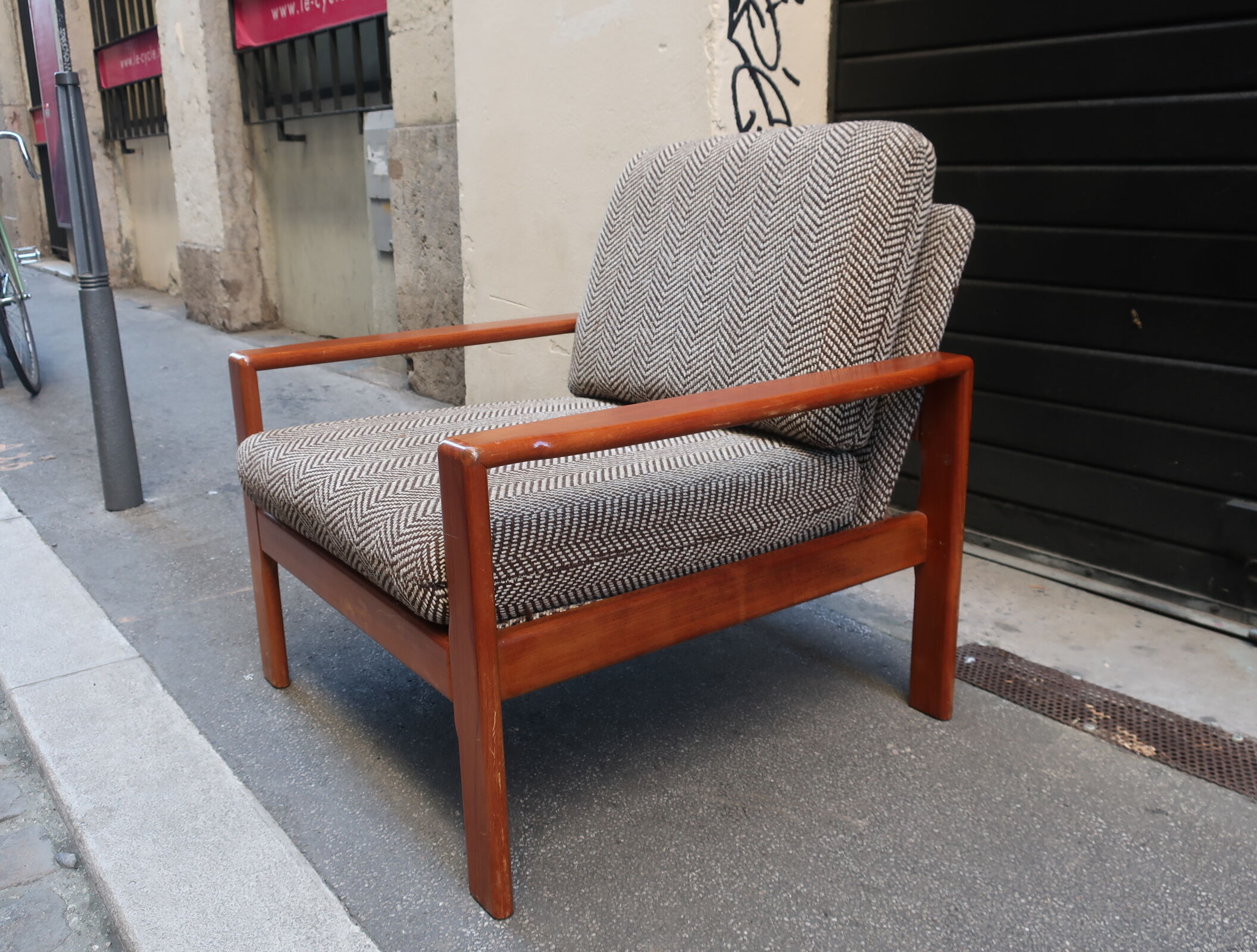 Scandinavian armchair in teak and fabric of the 60s