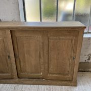 Large row of solid oak loom sliding doors