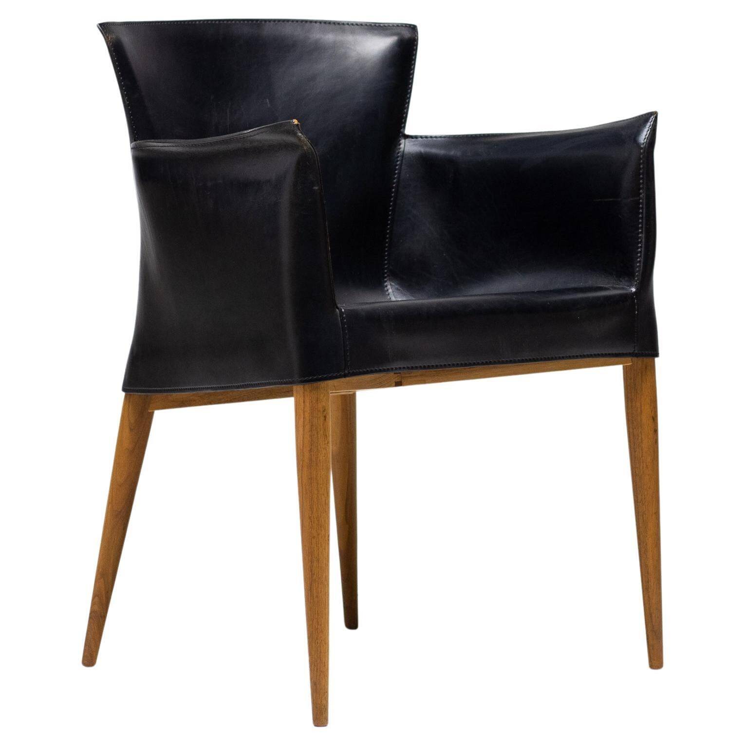 Set of four Vela leather armchairs by Carlo Bartoli - Italian modern elegance.