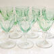 Set of nine glasses on foot in cut glass