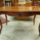 Curved desk in Louis XV style, made of carved and moulded walnut.