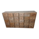 Industrial or apothecary workbench with 30 vintage wooden drawers.