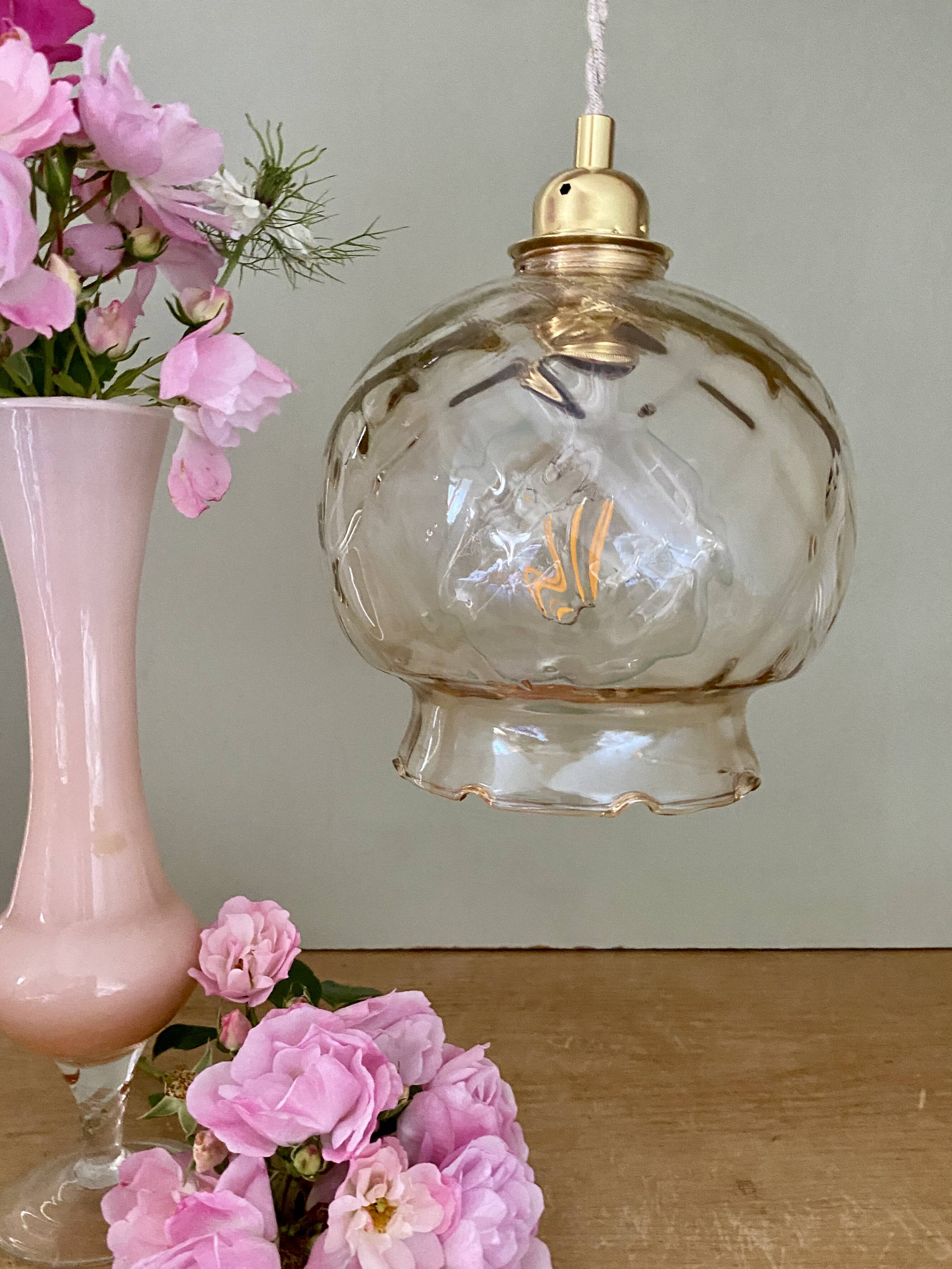 Suspension globe vintage en verre ambré
