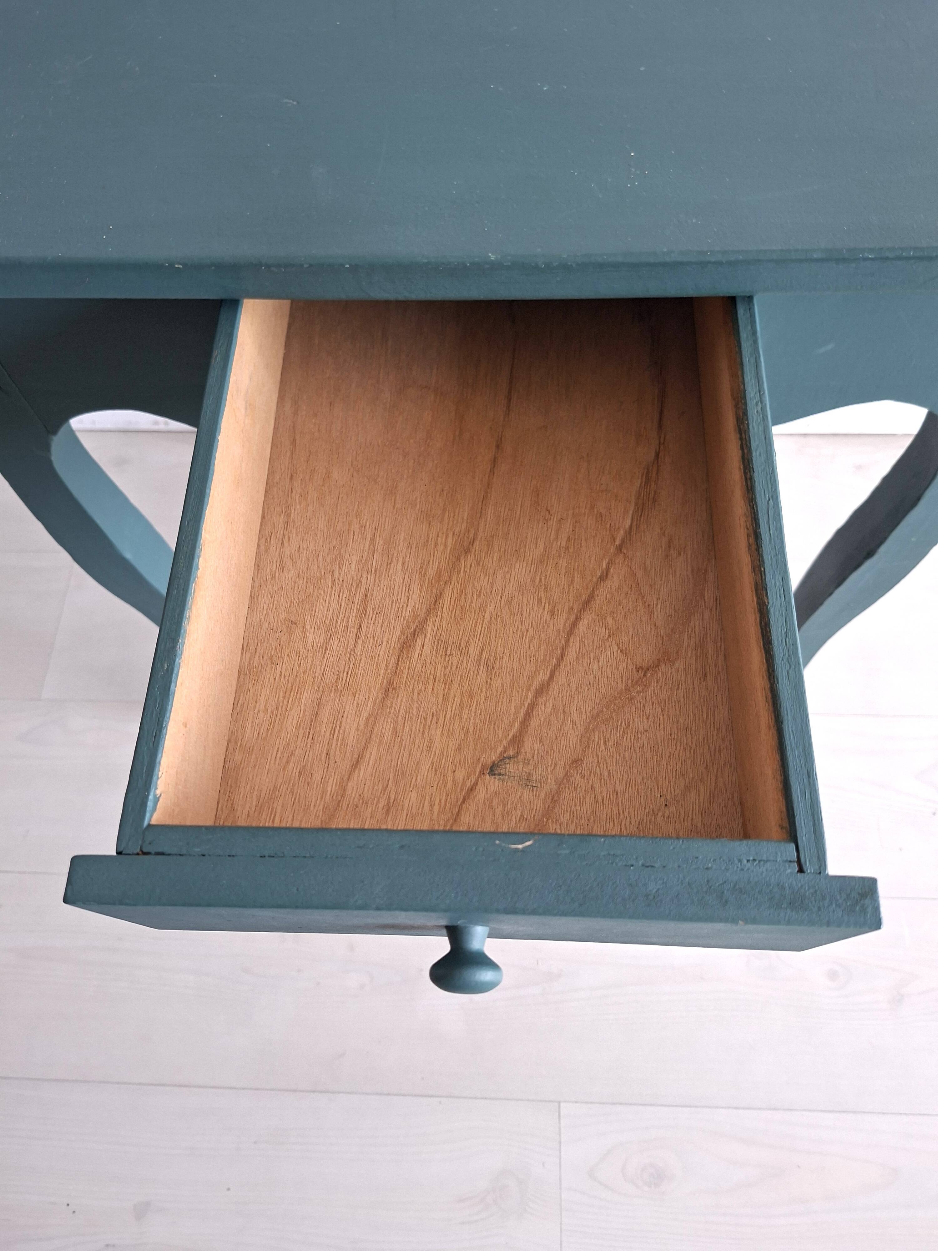 Antique Gustavian-style table painted in dark green with a drawer.